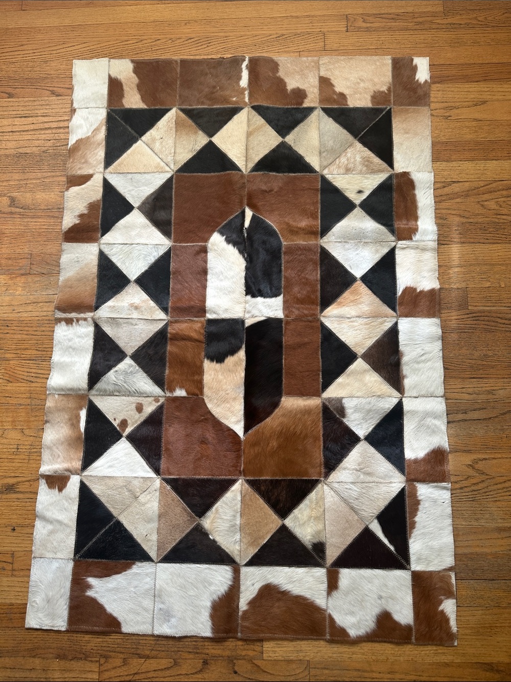 Hand Crafted Brown, White and Black Geometric Patchwork Cowhide Rug